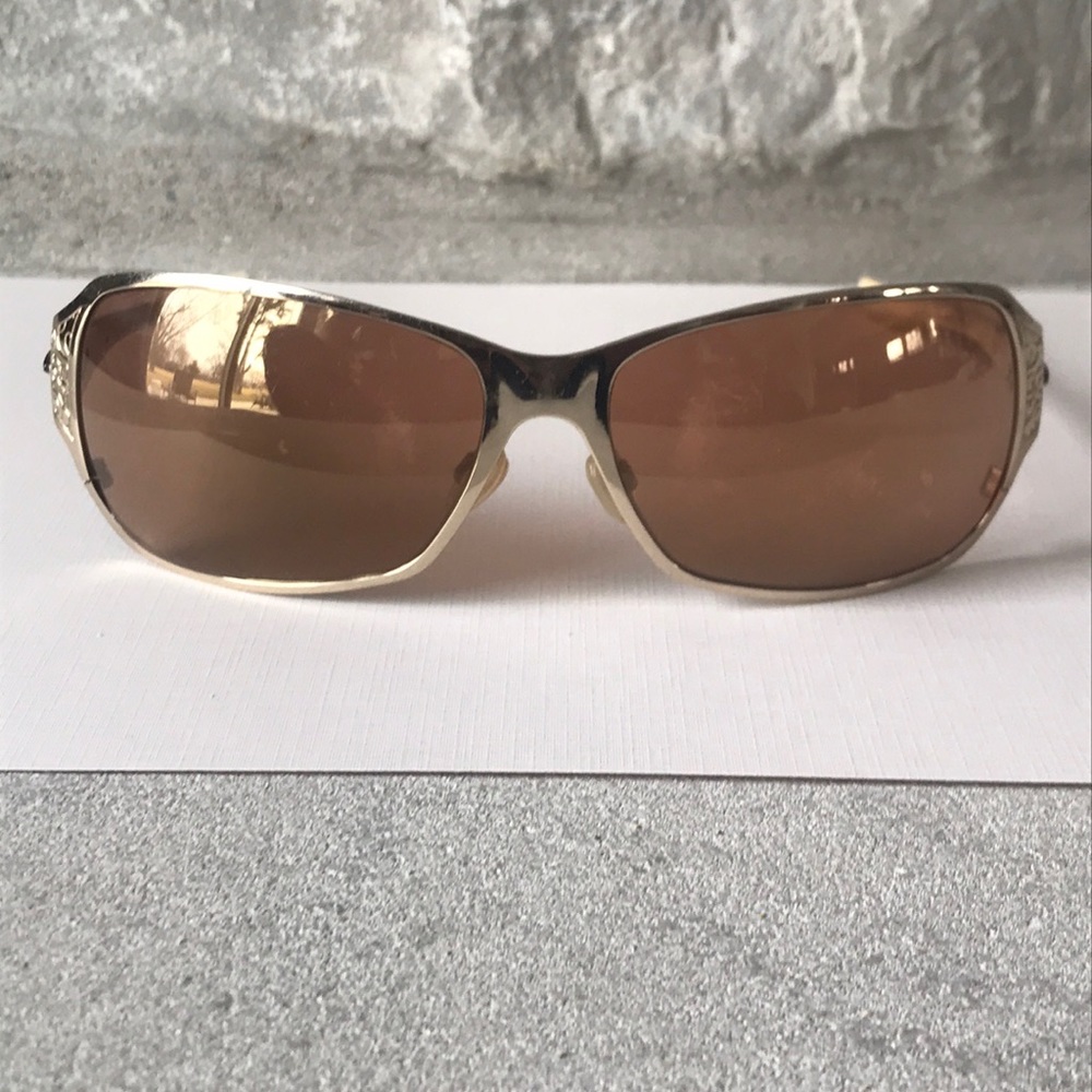 Oakley Behave gold women’s sunglasses